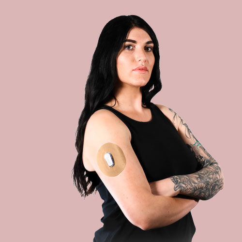 Woman with Skin Grip patch on her Dexcom